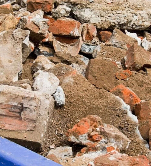 Construction debris removal by Rubbish Doctor for a safe job site.